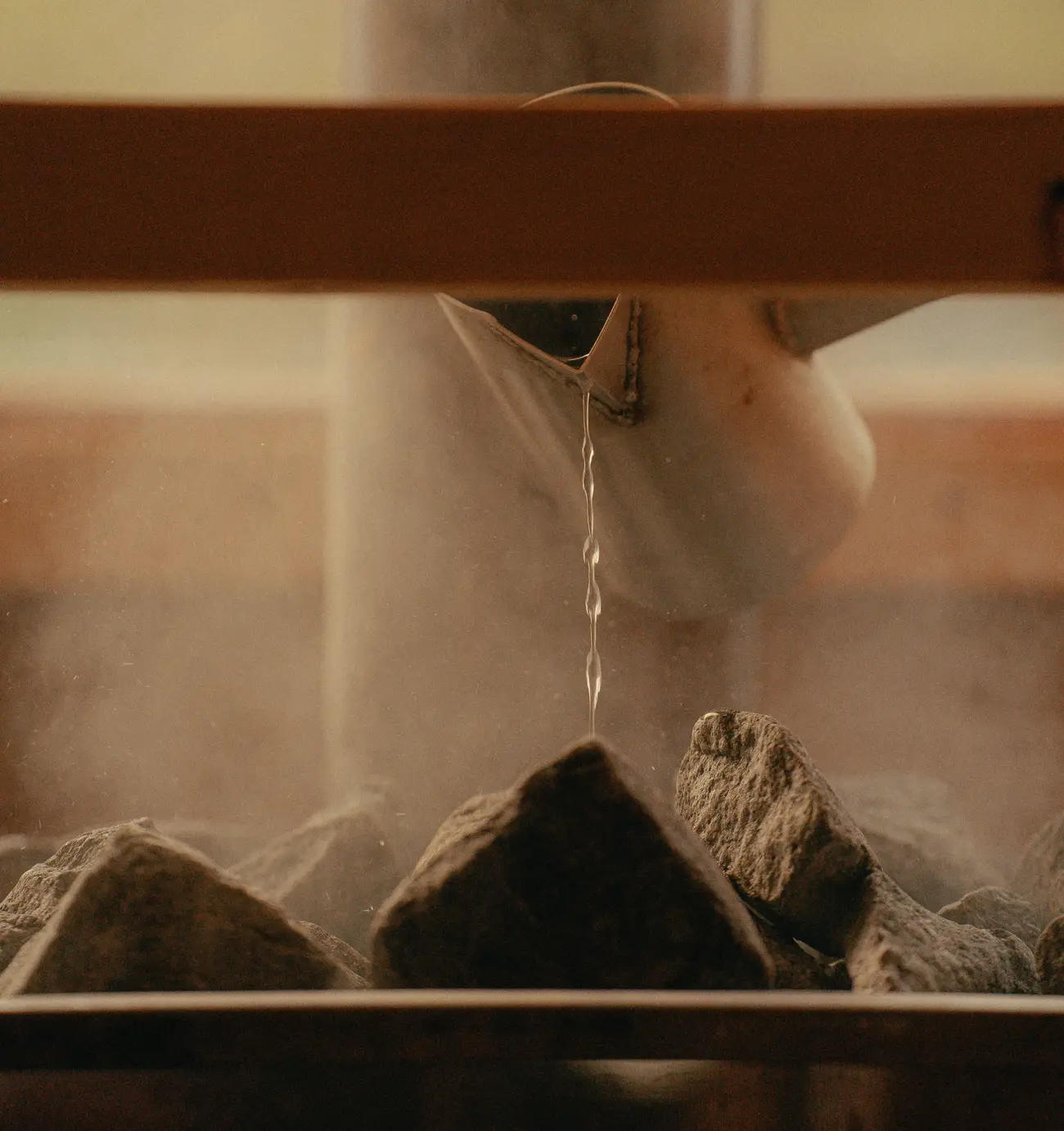 Pouring steam in the sauna