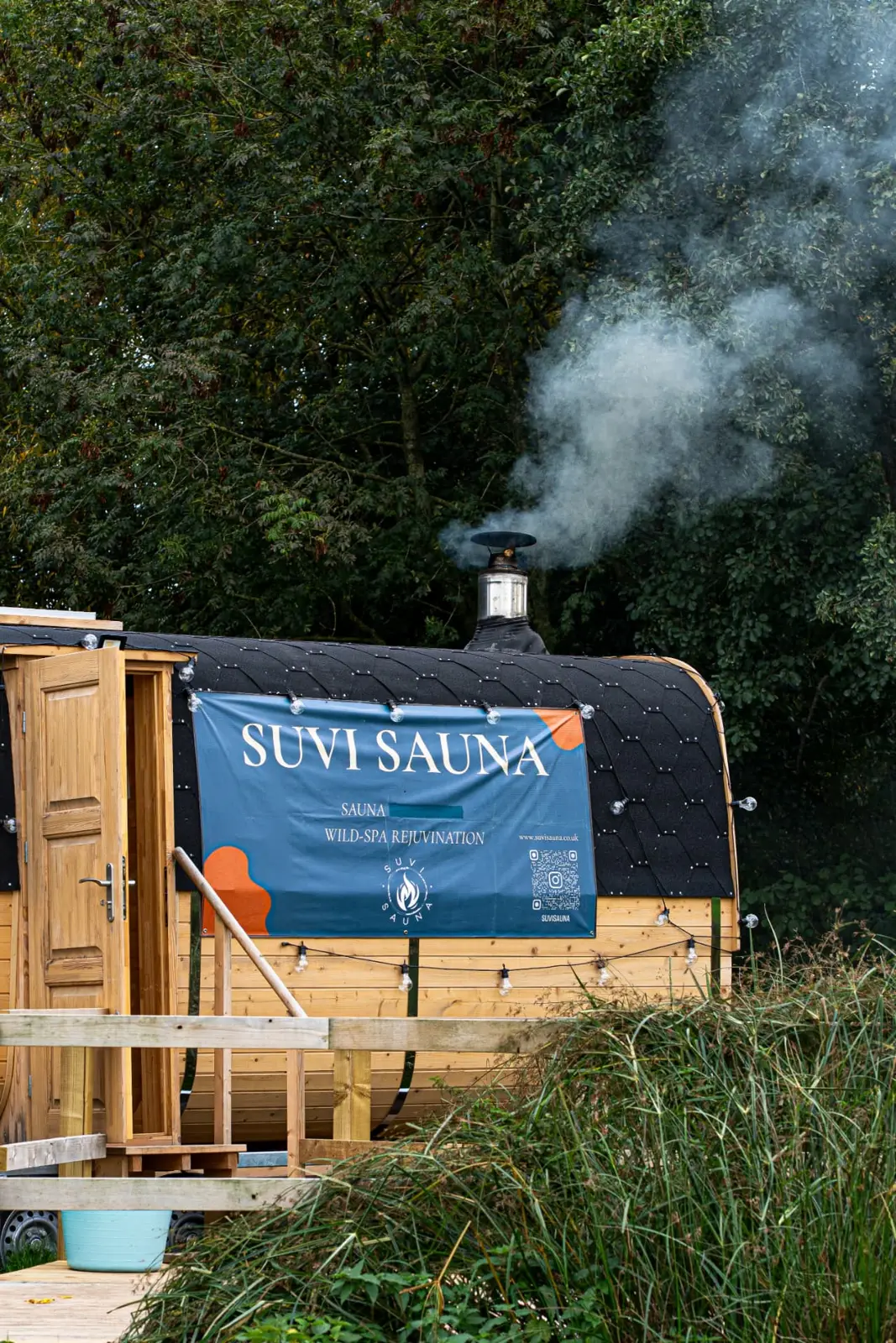 Smoke rising from the chimney of the Suvi Ross-on-Wye wood-fired sauna